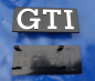 Preview: Chromgrill mit originalen Mittelteil +VW Emblem + GTI Zeichen